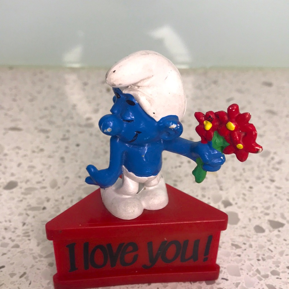 Vintage 1980s Bashful Smurf figure toy with stand